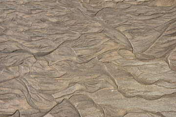 Sand texture line wave on the beach pattern for background