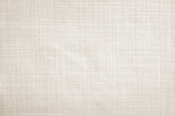 Close up beige linen fabric texture background	
