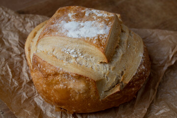 Top view of traditional italian bread on rustic paper