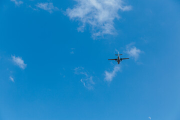 Fototapeta na wymiar Airplane in the sky on a sunny day.