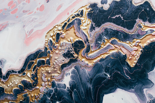 Abstract wave of liquid gold metal on blue wave background. Fluid Art. Marble effect background or texture © colnihko