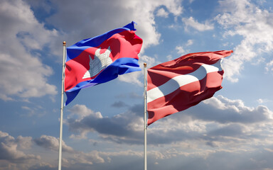 Flags of Latvia and Cambodia.