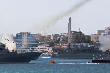 Large landing ships Novocherkassk and Caesar Kunikov are firing from multiple launch rocket systems Grad-M at the parade on Navy Day in the hero city of Sevastopol, Crimea