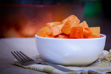 View of cut papaya in a bowl. Use for fruit and healthy eating concept.