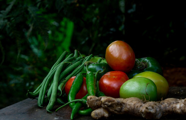 Fresh vegetables with blurred nature in the background