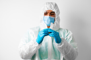 Fototapeta premium Doctor or nurse in protective medical suit preparing for vaccination