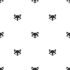 seamless symmetric pattern with foxes or wolves isolated on white