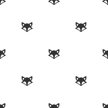 seamless symmetric pattern with foxes or wolves isolated on white