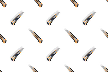 Stationery knives seamless pattern on a white background.