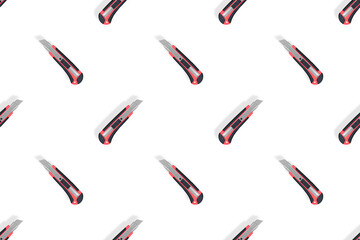 Stationery knives seamless pattern on a white background.