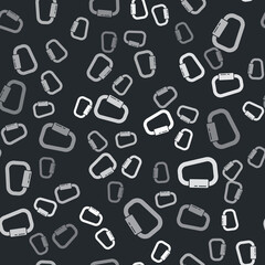 Fototapeta na wymiar Grey Carabiner icon isolated seamless pattern on black background. Extreme sport. Sport equipment. Vector Illustration.