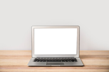 Modern laptop on table in office