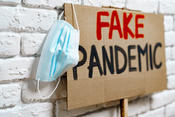 Protest placard against fake news about outbreak 2019-nCoV and treatment