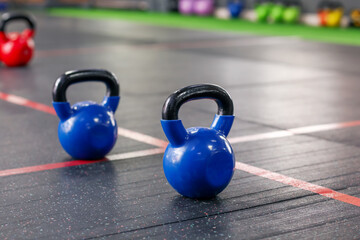 Fototapeta na wymiar Kettlebells in modern gym, closeup