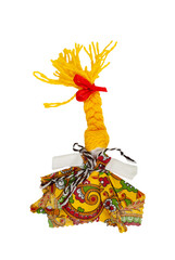 Traditional Russian fabric doll. A doll in a multi-colored dress and with yellow hair. Home amulet and children's toy.