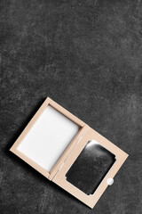 Blank cardboard box on dark background
