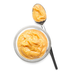 Bowl of peanut butter and spoon isolated on white background