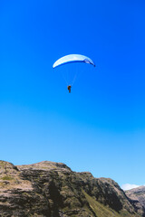 Fototapeta na wymiar Paragliding at Makapuu point, Oahu, Hawaii 