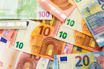 Pile of euro banknotes as background