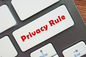 Business concept about Privacy Rule with sign on the page.
