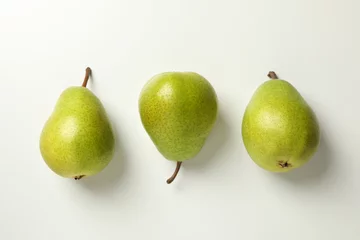 Poster Fresh green pears on white background, top view © Atlas