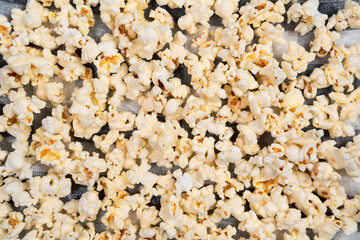 Popcorn close-up background texture. Copy, empty space for text