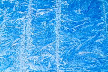 Beautiful natural frosty pattern on glass window