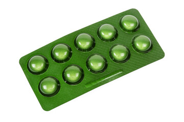 Green blister pack of pills on a white background