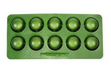 Green blister pack of pills on white background, top view