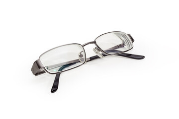 Modern eyeglasses in metal rim on white background