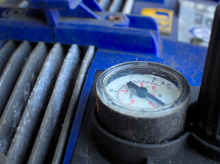 Close up of pressure gage of a pressure washer machine