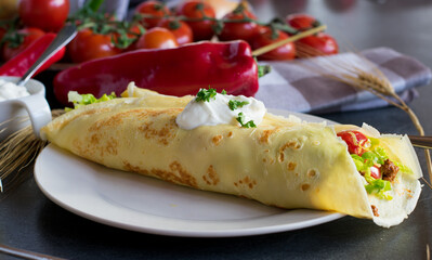 homemade burrito with spicy minced meat and bean  filling