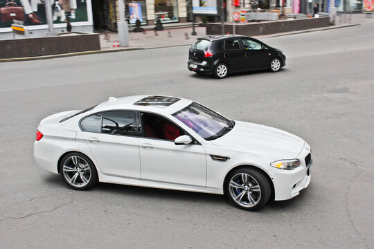 Kiev, Ukraine - April 22, 2012: BMW M5 F10 in the city. Car in motion