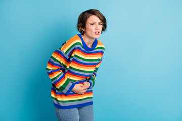 Portrait of depressed frustrated girl touching belly feeling bad healthcare spasm period isolated...