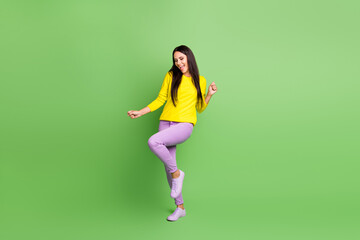 Fototapeta na wymiar Full body photo of pretty person dancing have good mood open mouth isolated on green color background