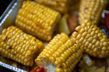 Close up of sweet corn roasted on the grill