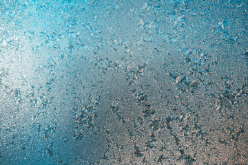 Ice patterns on winter glass, natural background