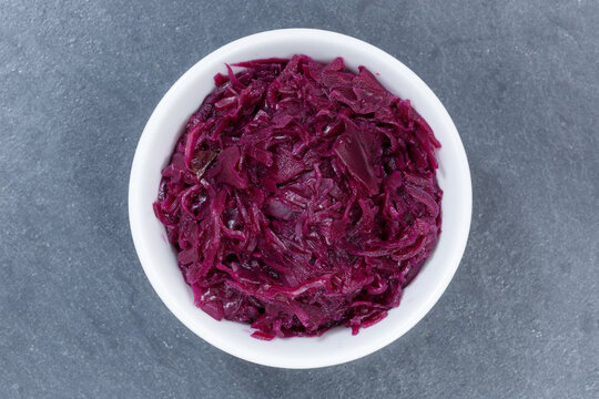 Sliced Red Cabbage From Above Bowl On A Slate