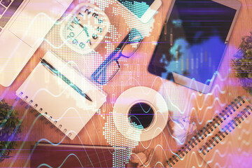 Fototapeta na wymiar Double exposure of financial chart hologram over desktop with phone. Top view. Mobile trade platform concept.