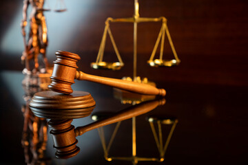 Law and justice concept. Law symbols composition: judge’s gavel, Themis  statue and scale.
