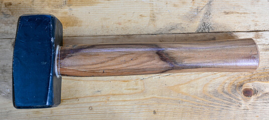 small but heavy sledgehammer with wooden hadle