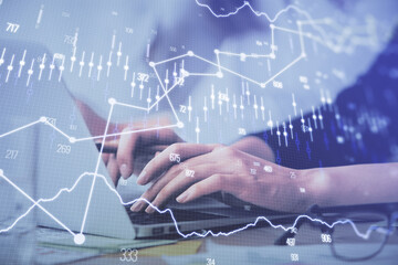 Multi exposure of woman hands typing on computer and financial graph hologram drawing. Stock market analysis concept.