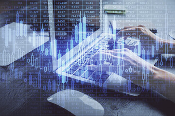 Double exposure of woman hands typing on computer and forex chart hologram drawing. Stock market invest concept.