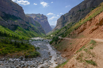 Colorful landscape view of Khingob river valley between Tavildara and Khoburobot pass in Tajikistan © Cyril Redor