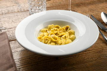 Bowl of tortellini or cappelletti pasta in broth