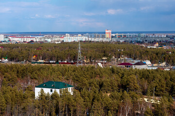 Panoramic view of Yakutsk skyline with forest on a beautiful day - 401954204