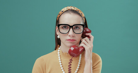 Retro style woman on the phone