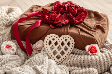 Composition with valentine's day gift and festive decor details.