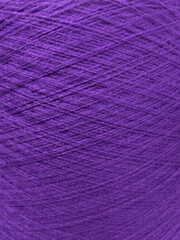 the texture of the purple thread in the coil as a background
