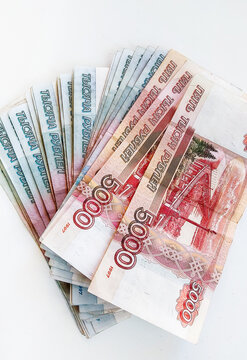 Russian rubles of the one thousand and five thousand categories on a white background